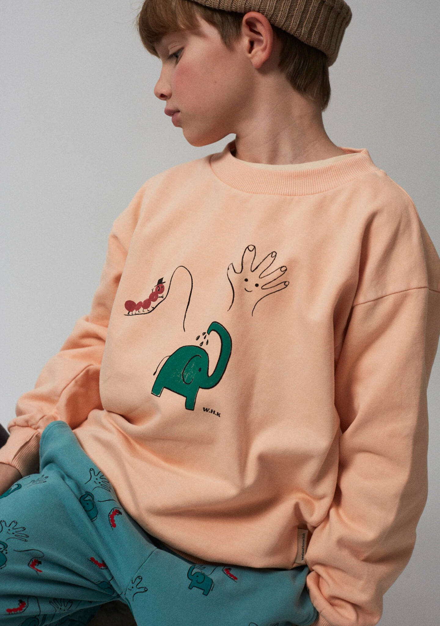 Hand print sweatshirt (soft orange)